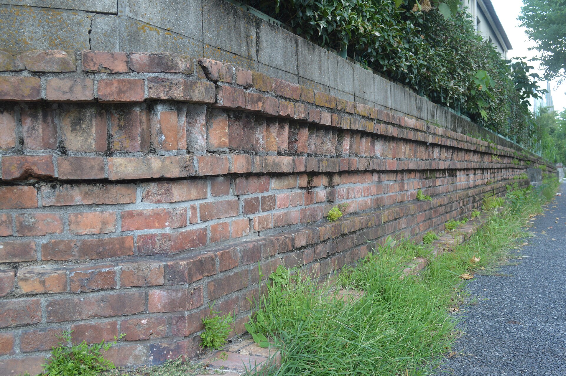 Nagoya City Industrial Arts High School brick wall ac — industrial site in Nagoya, Japan